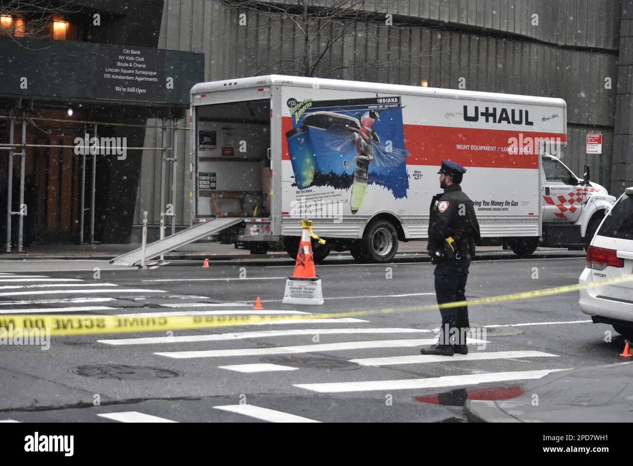 Manhattan, United States. 14th Mar, 2023. A Police Officer Watches The ...