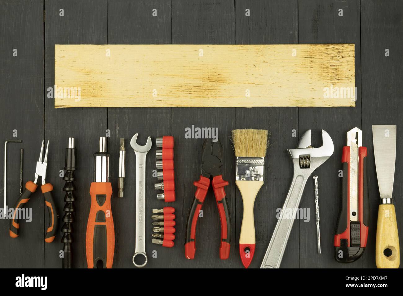 Tools on a rustic background with copy space. Working tools on a wooden ...