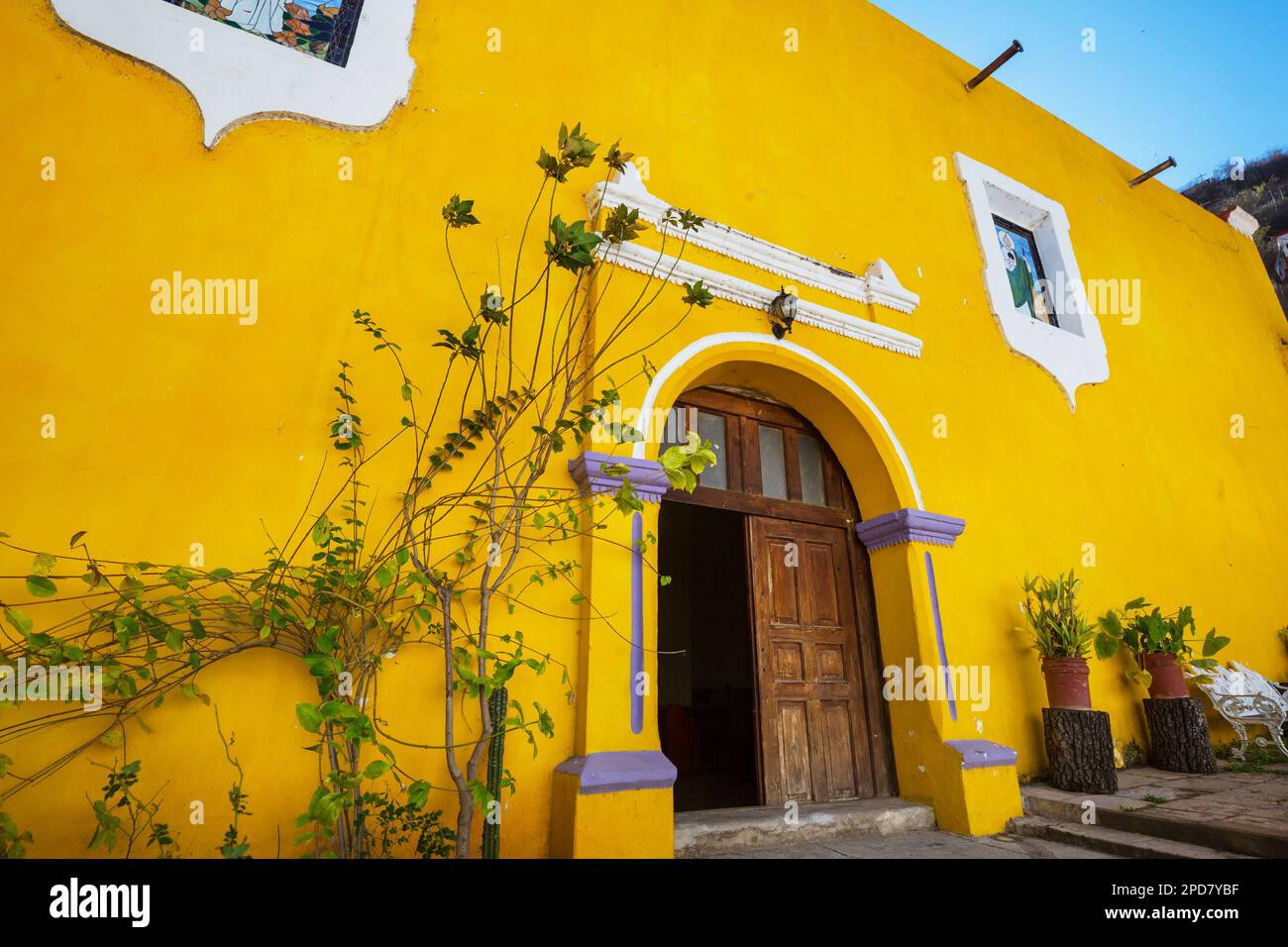 Amazing colorful buildings in pueblo magico Batopilas in Barrancas del Cobre mountains, Mexico Stock Photo