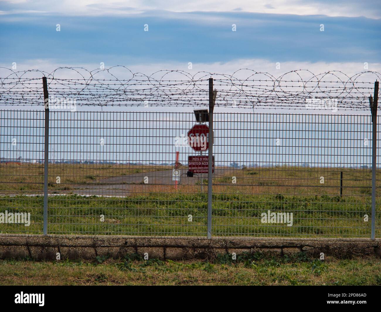 Airport security perimeter fencing system with razor wire with SRA
