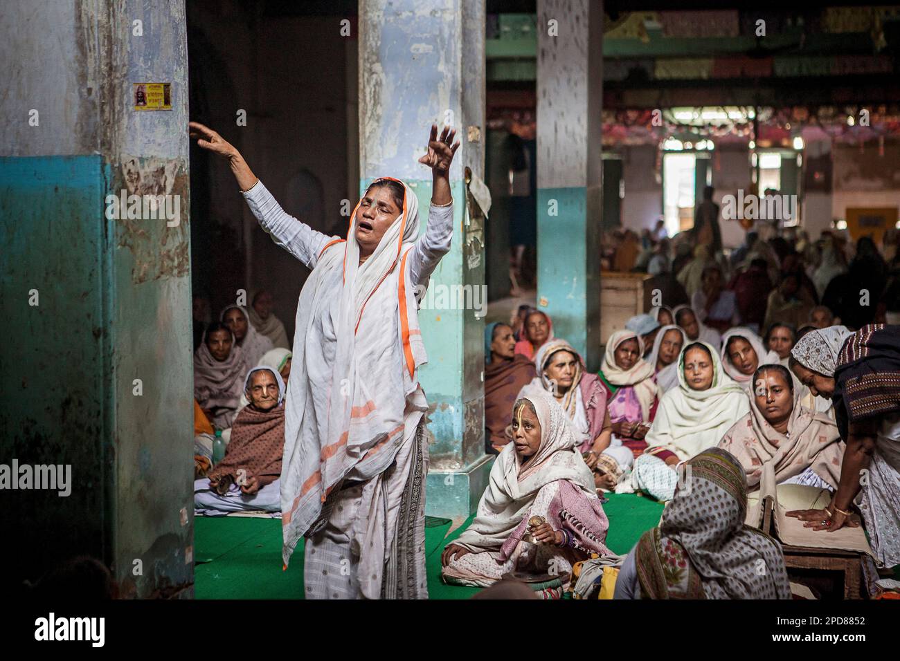 Widows praying in a Bhajan ashram Vrindavan Mathura district India