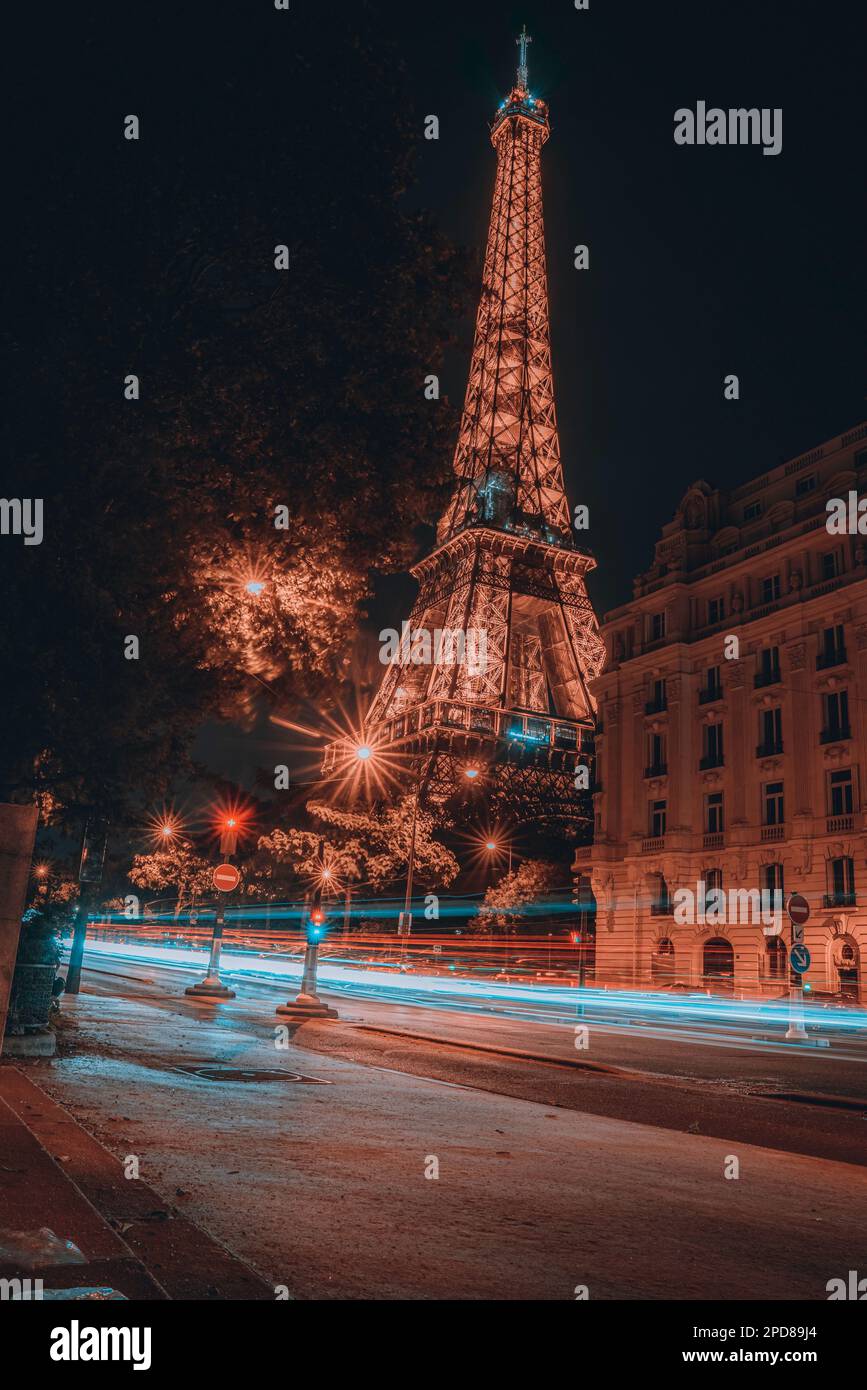 Timelapse Eiffel Tower illuminated night in Paris France Stock Photo