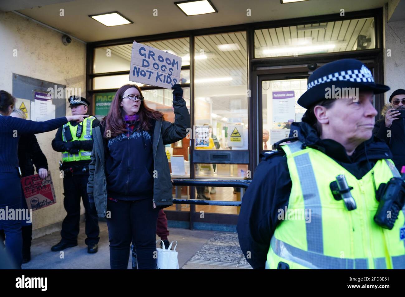 A Trans rights activist take part in a demonstration outside Portobello Library, Edinburgh