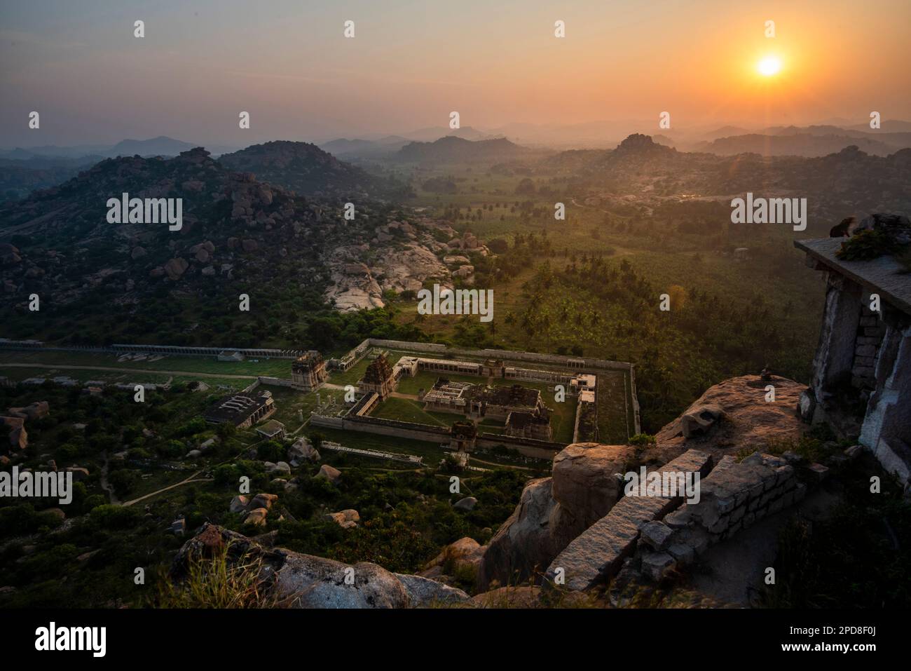 View of Achyuta Raya Temple at sunrise from Hemakuta Hill in Hampi ...