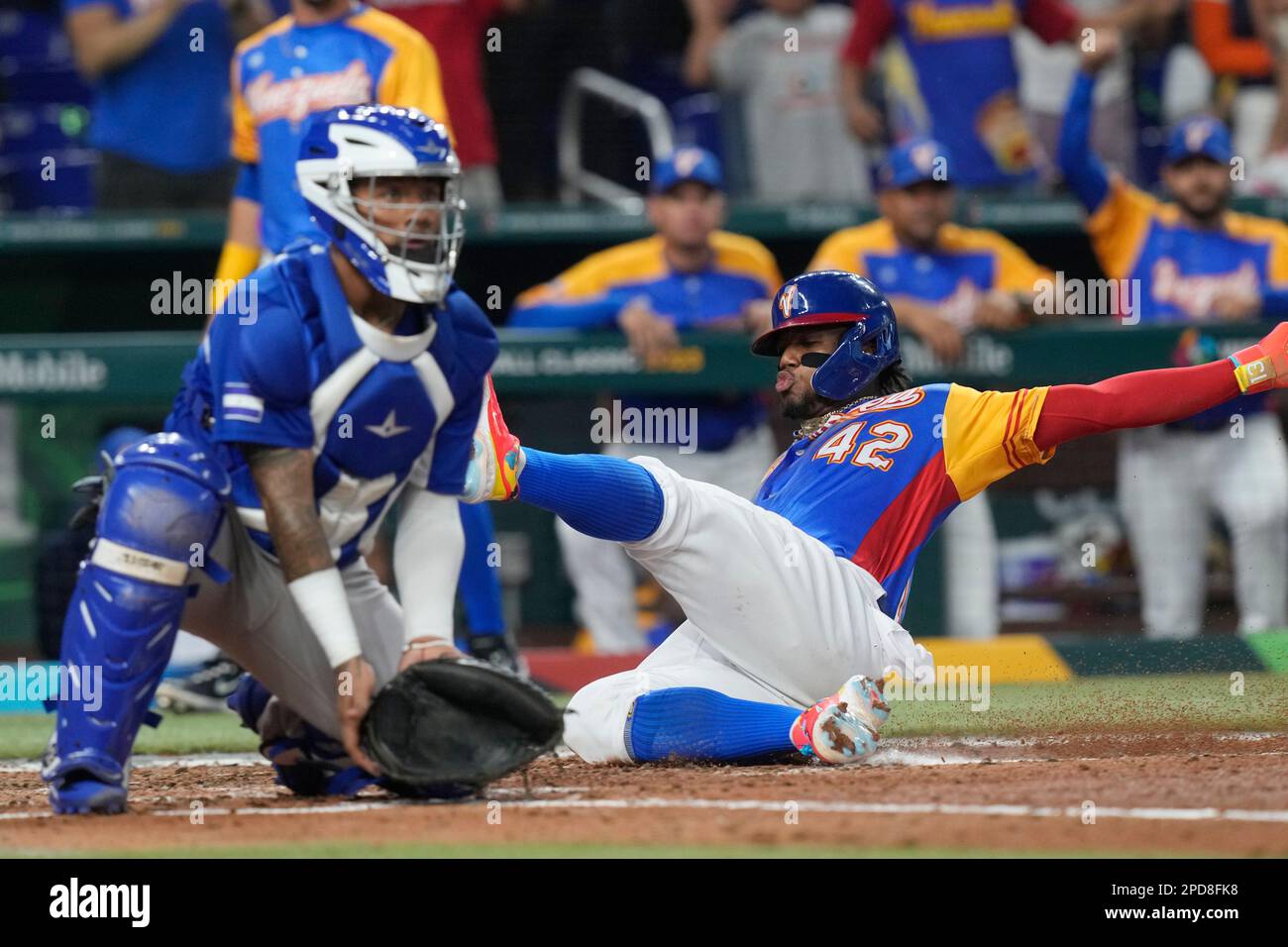 Venezuela's Ronald Acuna Jr. (42) walks to the dugout before an