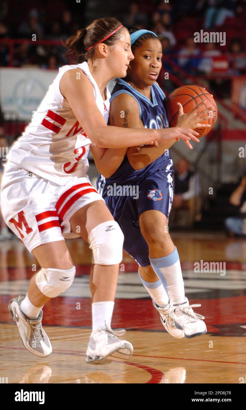 Iroquois' LaQuisha Wharton, right, drives past Montgomery County's
