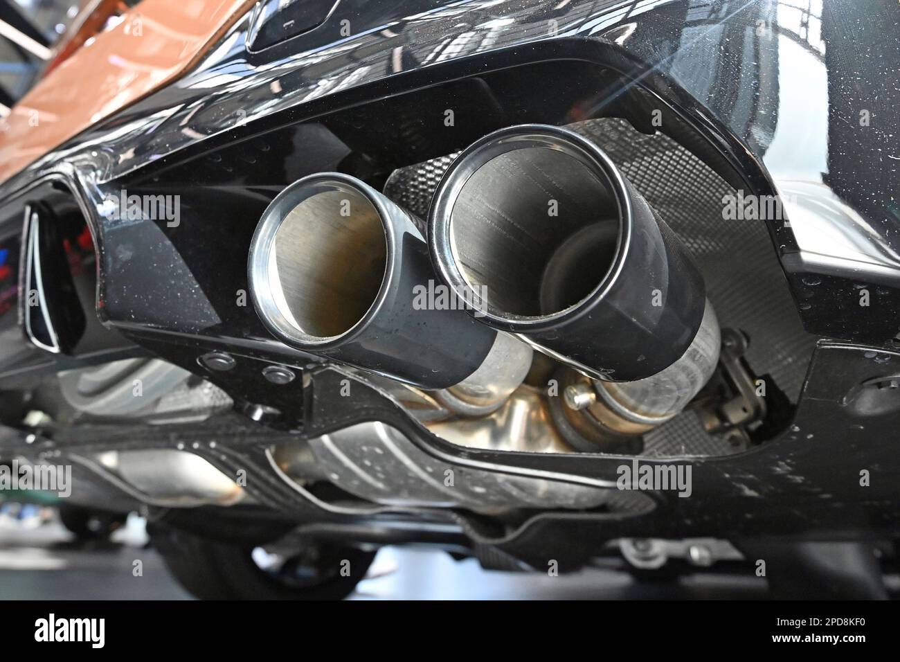 Munich, Deutschland. 13th Mar, 2023. Feature, edge motif, exhaust system  for combustion engines, exhaust tailpipes, cars, passenger cars in the BMW  world. Automaker, car, cars, automobiles, manufacturer, auto industry,  premium brand. ?