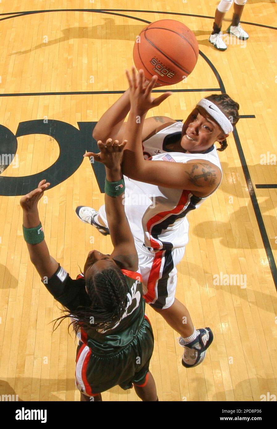Virginia's Lyndra Littles, right, shoots over Miami's Albrey Grimsley