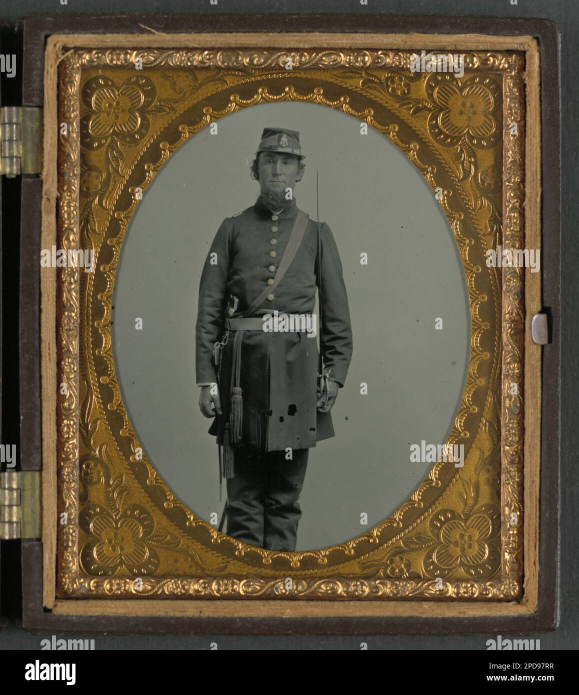 Colonel Joseph Walker of Co. K, 5th South Carolina Infantry Regiment, and Field and Staff, Palmetto South Carolina Sharpshooters Regiment, in uniform, two-piece belt buckle with palmetto, and sash over shoulder for officer of the day, with eagle head sword. Liljenquist Family Collection of Civil War Photographs , FAmbrotype/Tintype photograph filing series , pp/liljconfed. Walker, Joseph, 1835-1902, Confederate States of America, Army, South Carolina Infantry Regiment, 5th, People, 1860-1870, Soldiers, Confederate, 1860-1870, Military uniforms, Confederate, 1860-1870, Daggers & swords, 1860-18 Stock Photo