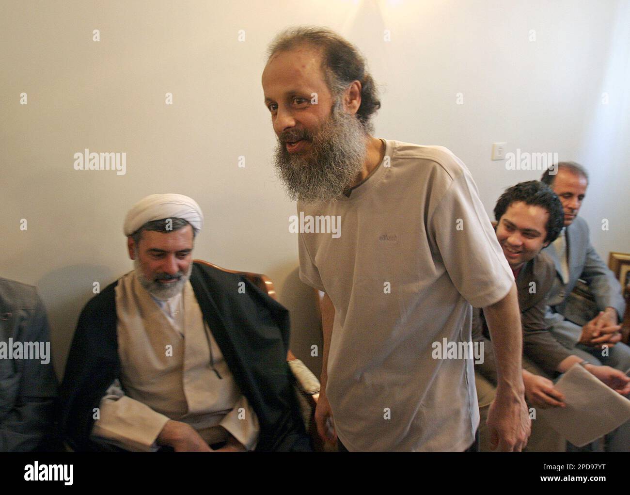 Iran's Most Senior Dissident Journalist, Akbar Ganji, Center, Who Was ...