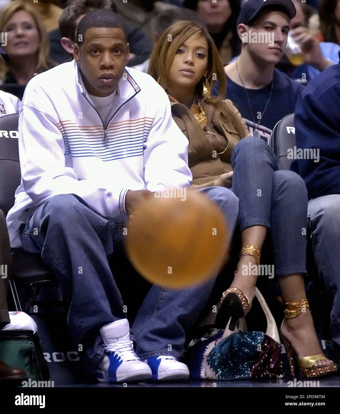 Rapper and record label executive Jay-Z, left, and singer Beyonce Knowles watch the New Jersey Nets beat the Los Angeles Lakers, 92-89, during NBA basketball, Friday, March 17, 2006 in East Rutherford, Rapper and record label executive Jay-Z, left, and singer Beyonce Knowles watch the New Jersey Nets beat the Los Angeles Lakers, 92-89, during NBA basketball, Friday, March 17, 2006 in East Rutherford,