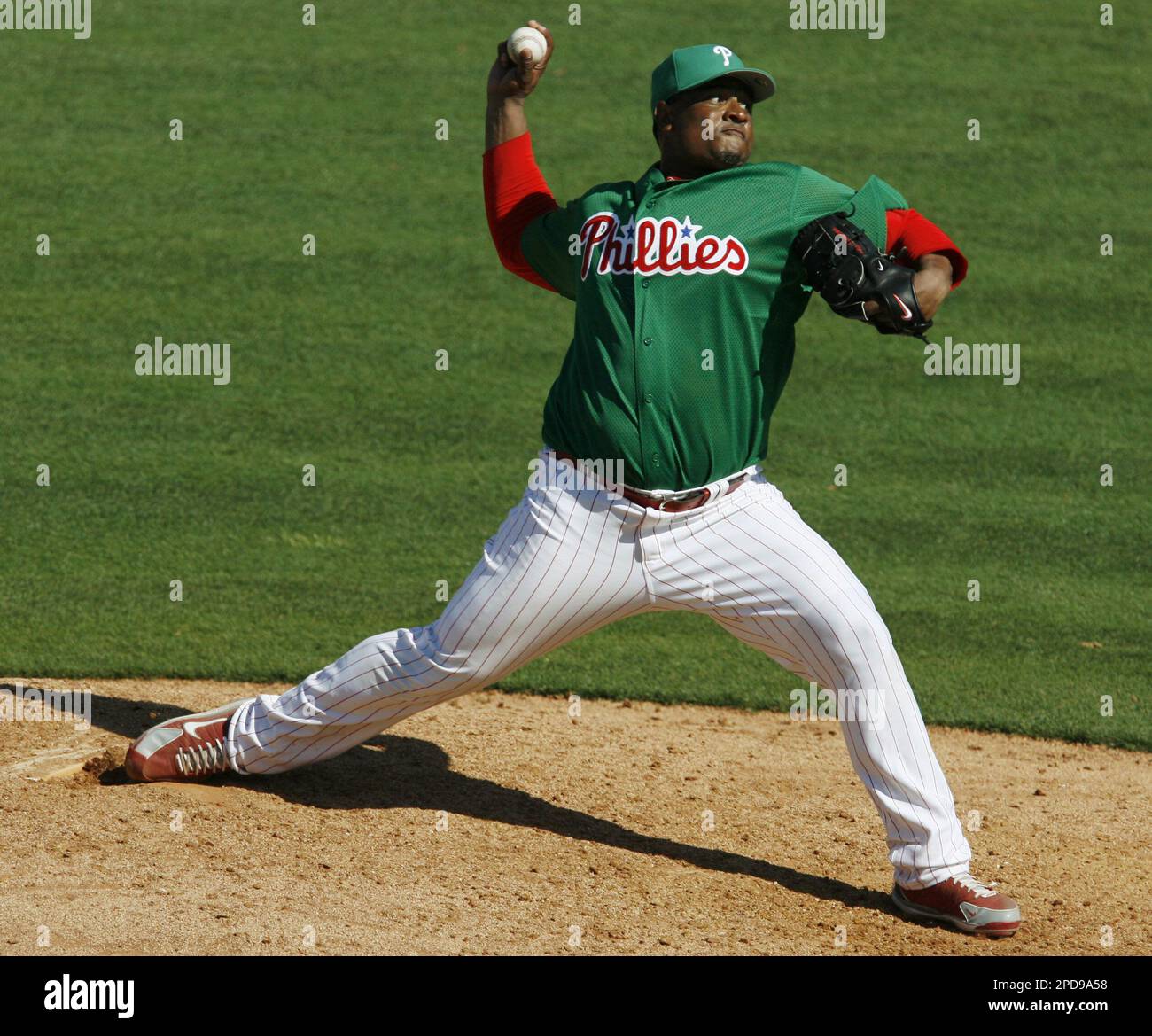 Philadelphia Phillies reliever Julio Santana winds up for a pitch in the  eighth inning of the