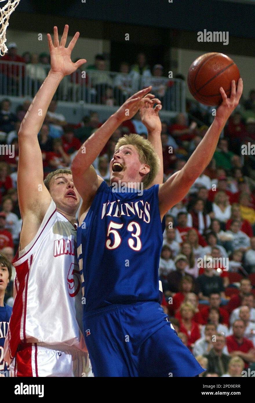 Marquette's Jordan Eglseder, right defends against Northwood Kensett's  Preston Davidson in a Class 1A semifinal at the Boys State basketball  tournament, Thursday March 16, 2006 in Des Moines, Iowa. (AP Photo/Steve  Pope