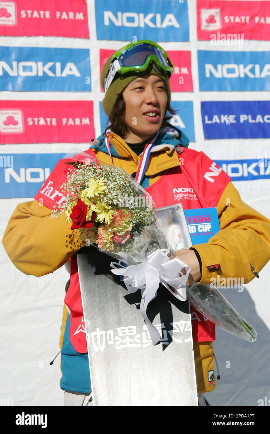 Third place winner Takihiro Ishihara of Japan smiles, on the