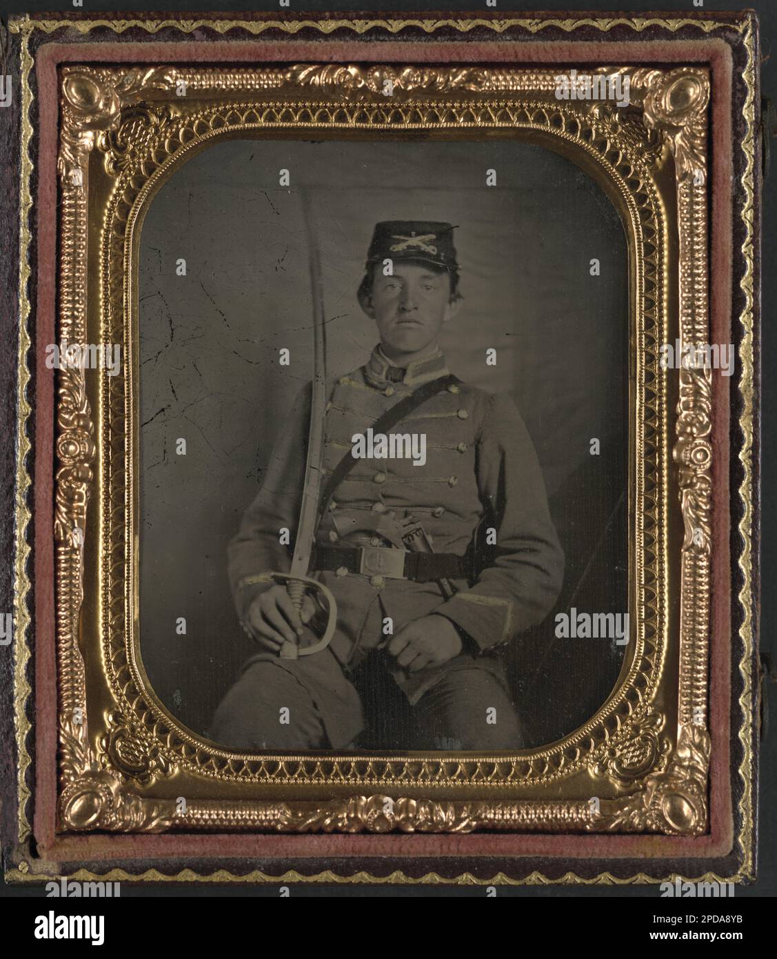 Private David M. Thatcher of Company B, Berkeley Troop, 1st Virginia Cavalry Regiment, in uniform and Virginia sword belt plate with Adams revolver and cavalry sword. Liljenquist Family Collection of Civil War Photographs , Published in: Echoes of glory : Arms and equipment of the Union. Alexandria, Va.: Time-Life Books, 2000, p. 54, Published in: Still more Confederate faces / D. A. Serrano. Bayside, N.Y.: Metropolitan Company, 1992, p. 167, Published in: Even more Confederate faces / by William A. Turner. Gaithersburg, Md.: Olde Soldier Books, Inc,1993, p. 109, Published in: Confederate belt Stock Photo