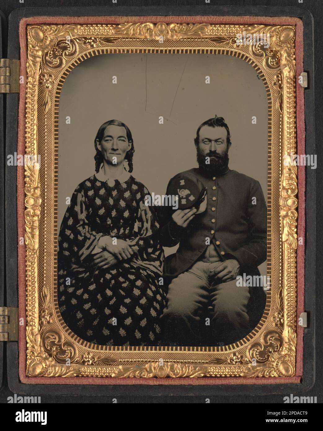 Tintype photo of lady in dress with balloon sleeves (1860s-1870s) Tintype photo of lady in dress with balloon sleeves (1860s-1870s)