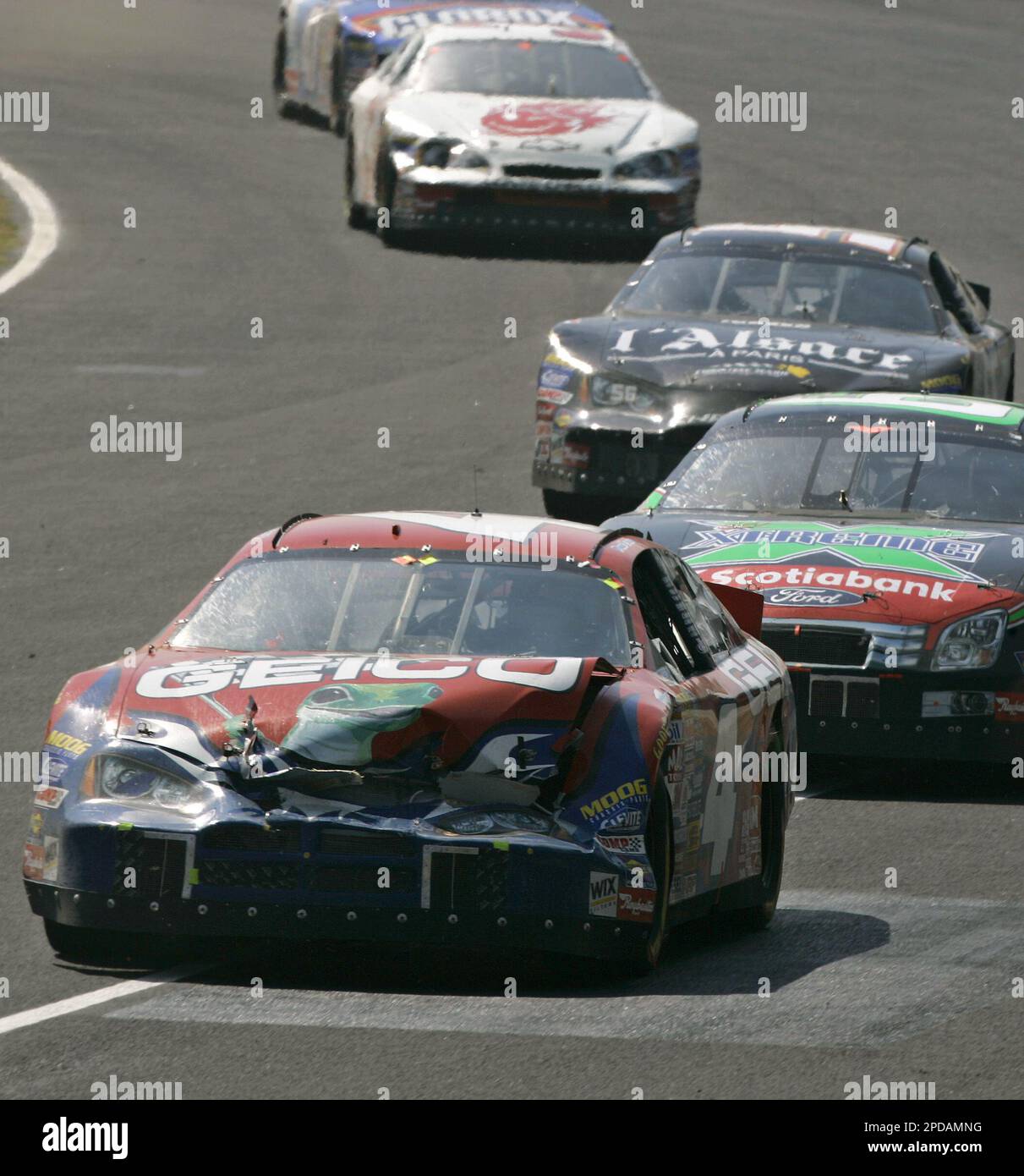 Paul Tracy, of the GEICO BryMak Dodge team, drives his car after he ...