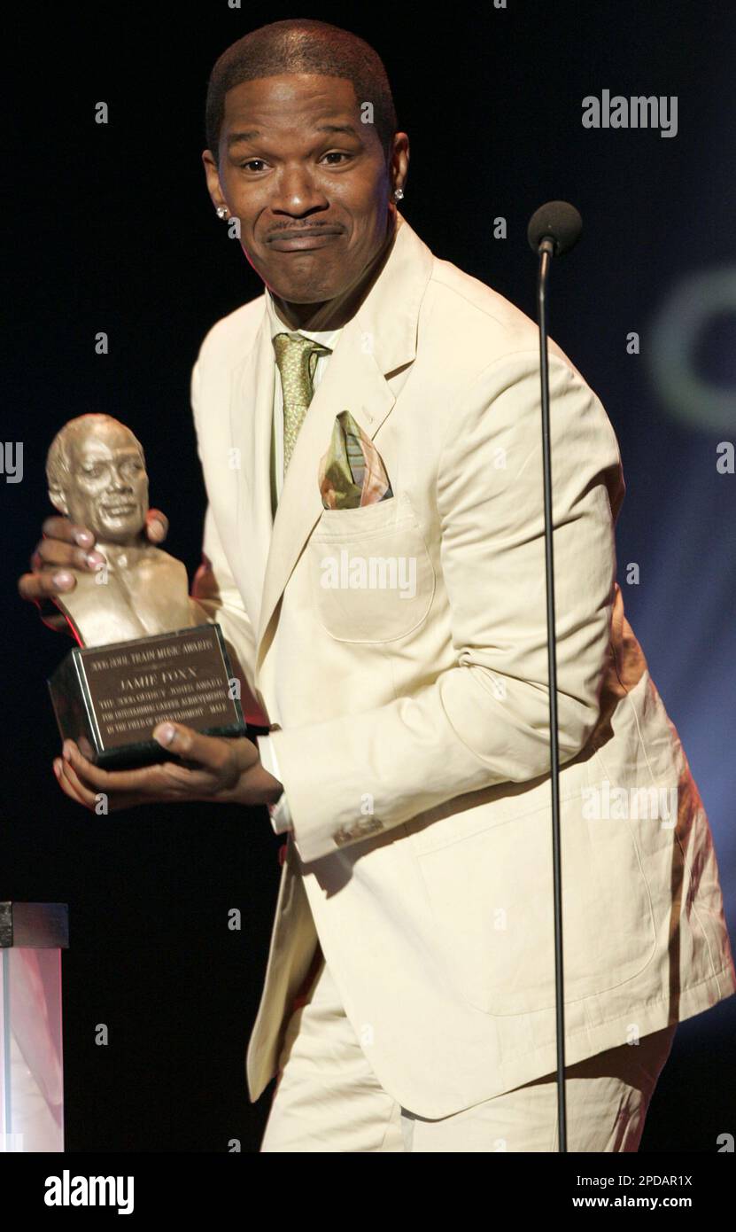 Entertainer Jamie Foxx accepts the "Quincy Jones Award for Outstanding