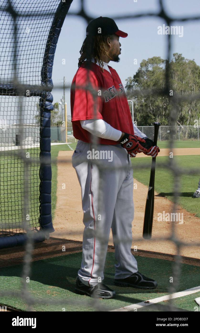 Boston Red Sox' Manny Ramirez stands waiting in the batting cage at