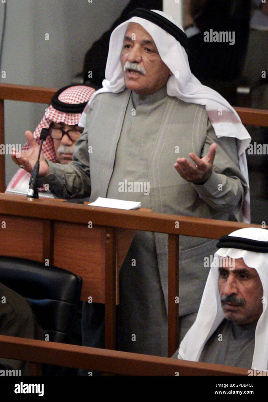 Former Iraqi Vice President Taha Yassin Ramadan speaks to the court during the trial of Saddam Hussein in Baghdad Wednesday March 1, 2006