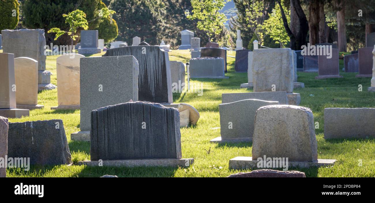 Headstones in cemetery during hi-res stock photography and images - Alamy