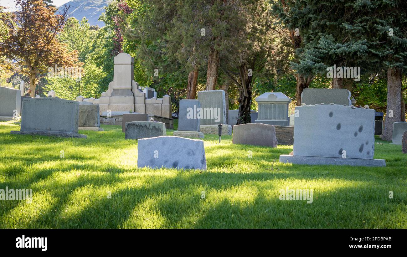 Headstones in cemetery during hi-res stock photography and images - Alamy