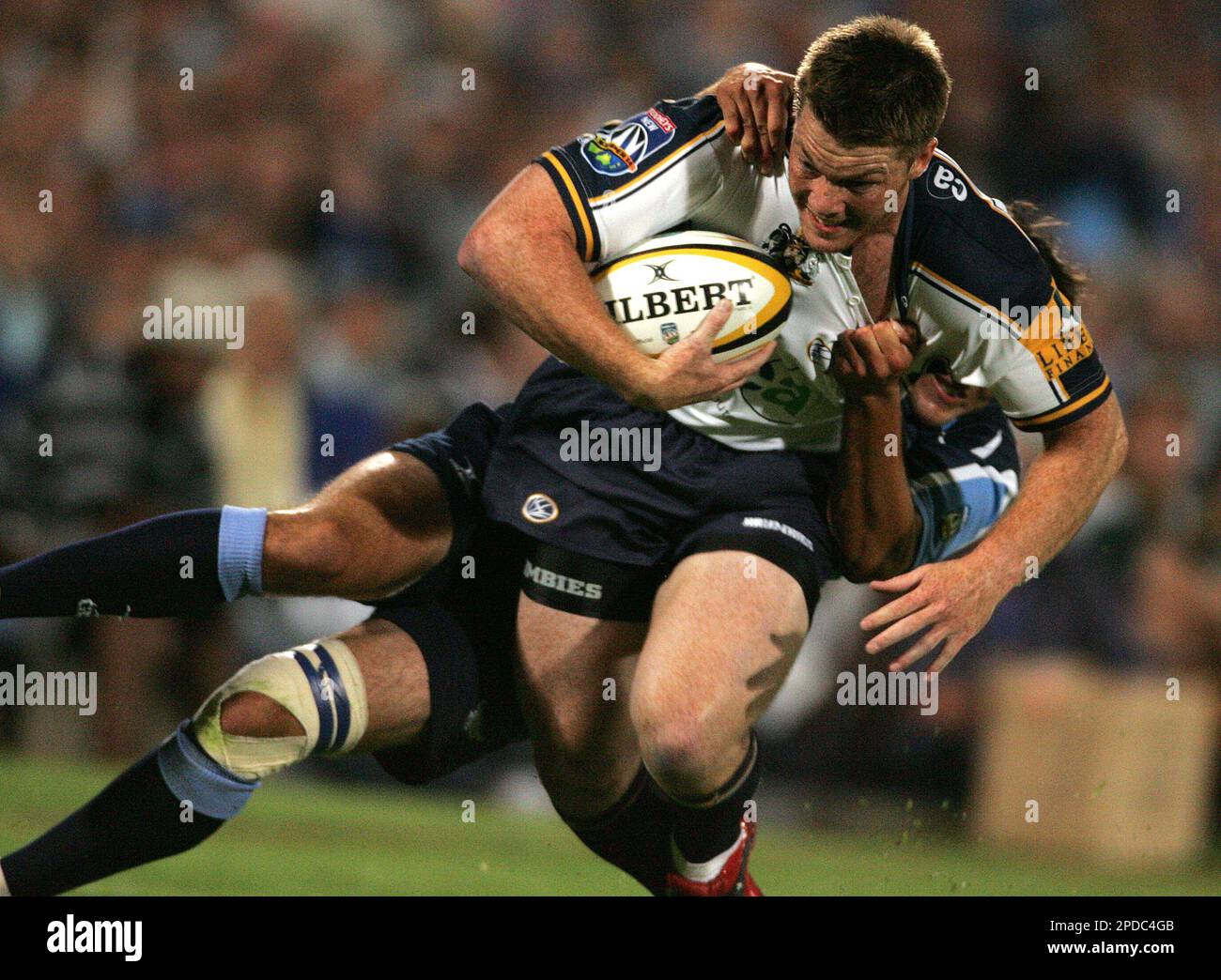 Clyde Rathbone Rugby South Africa's Bulls Fourie du Preez, back, tackles Australia's ...