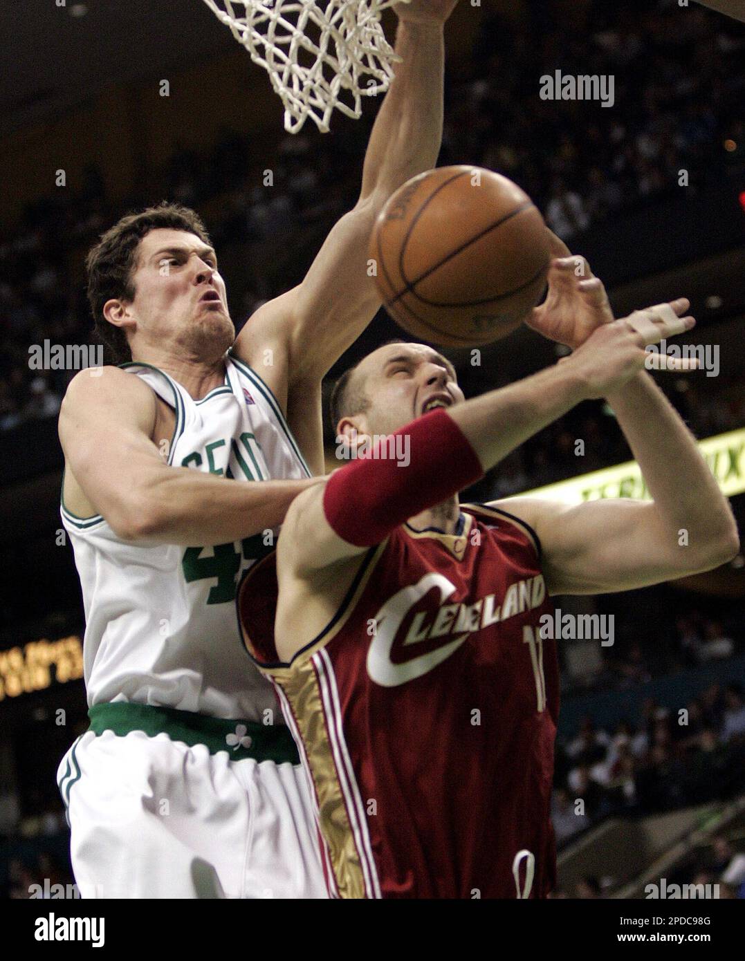 Boston Celtics' Raef LaFrentz, left, fouls Cleveland Cavaliers