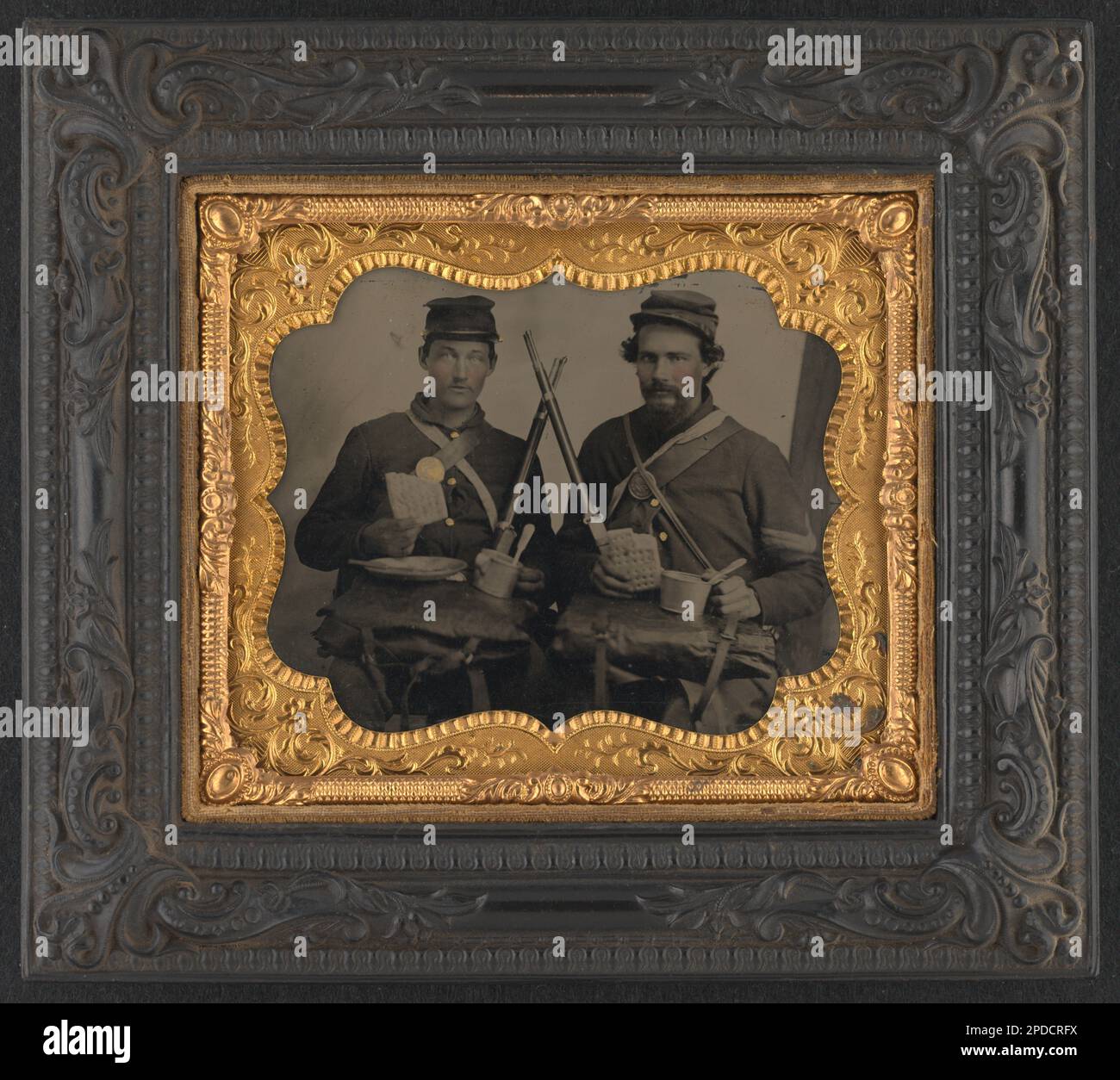 Tintype photo of 2 young gentlemen in 'forest' setting (1860s-1870s) Tintype photo of 2 young gentlemen in 'forest' setting (1860s-1870s)