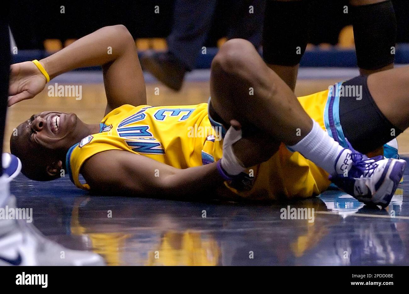 New Orleans/Oklahoma City Hornets' Chris Paul grimaces after landing on his  back and bruising his tailbone during fourth quarter NBA basketball against  the New Jersey Nets Monday night, Feb. 6, 2006 in