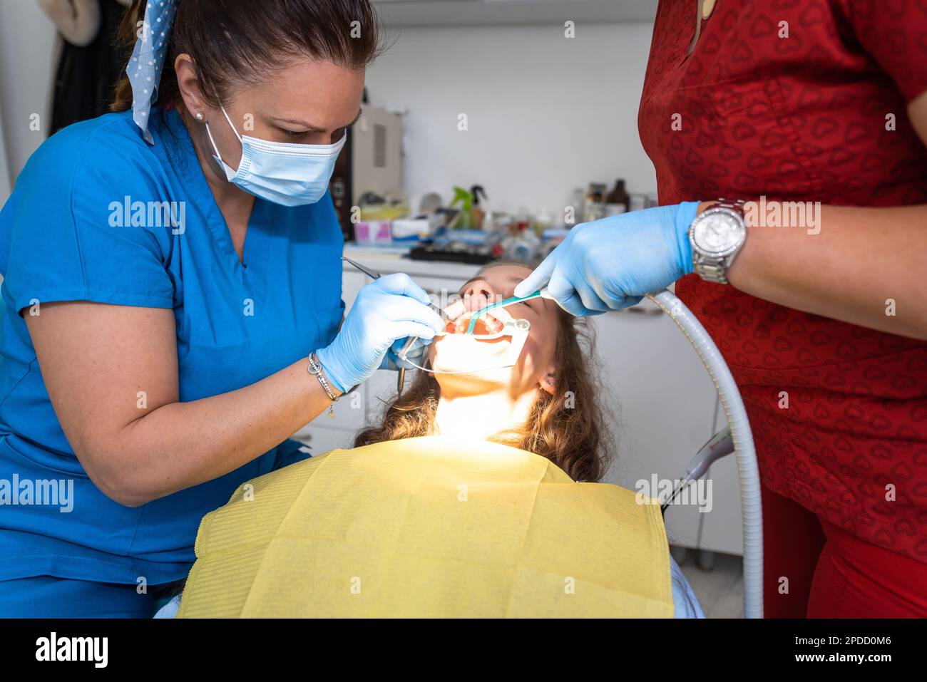 Dentist appointment at a dental clinic, placing braces locks on the