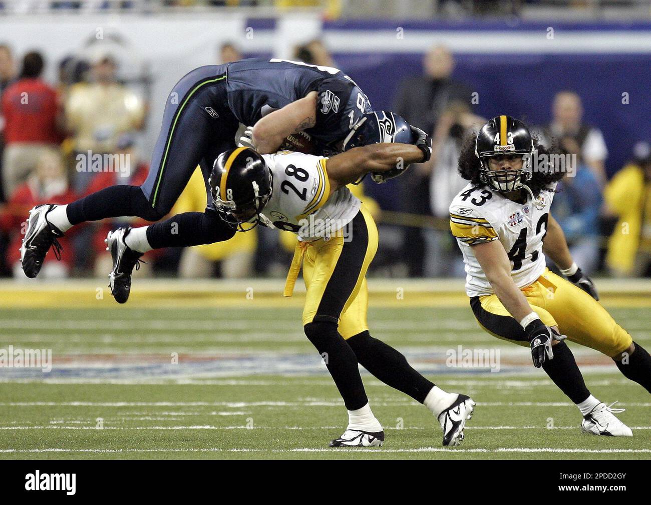 Joe Jurevicius of the Seattle Seahawks is tackled by Scott Shanle