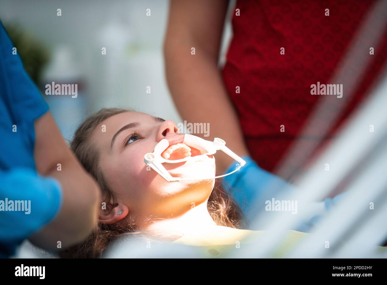 Dentist appointment at a dental clinic, placing braces locks on the