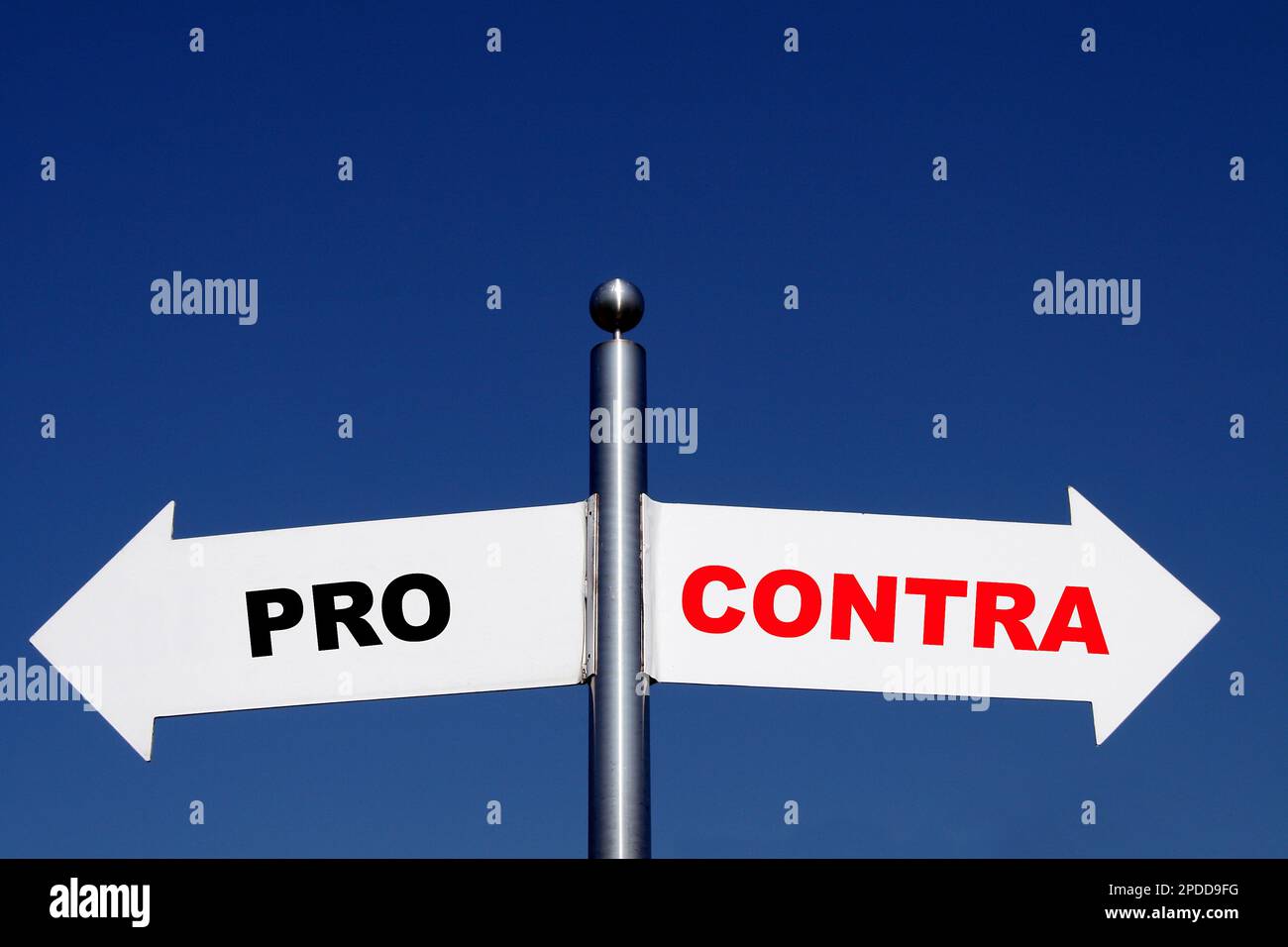 signposts pointing in different directions, options pro - contra Stock Photo