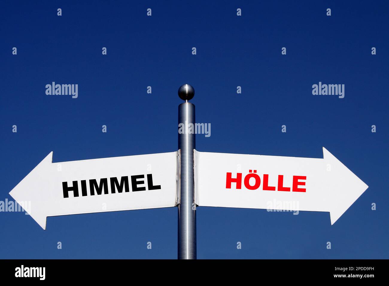 signposts pointing in different directions, options Himmel - Hoelle, sky - hell Stock Photo
