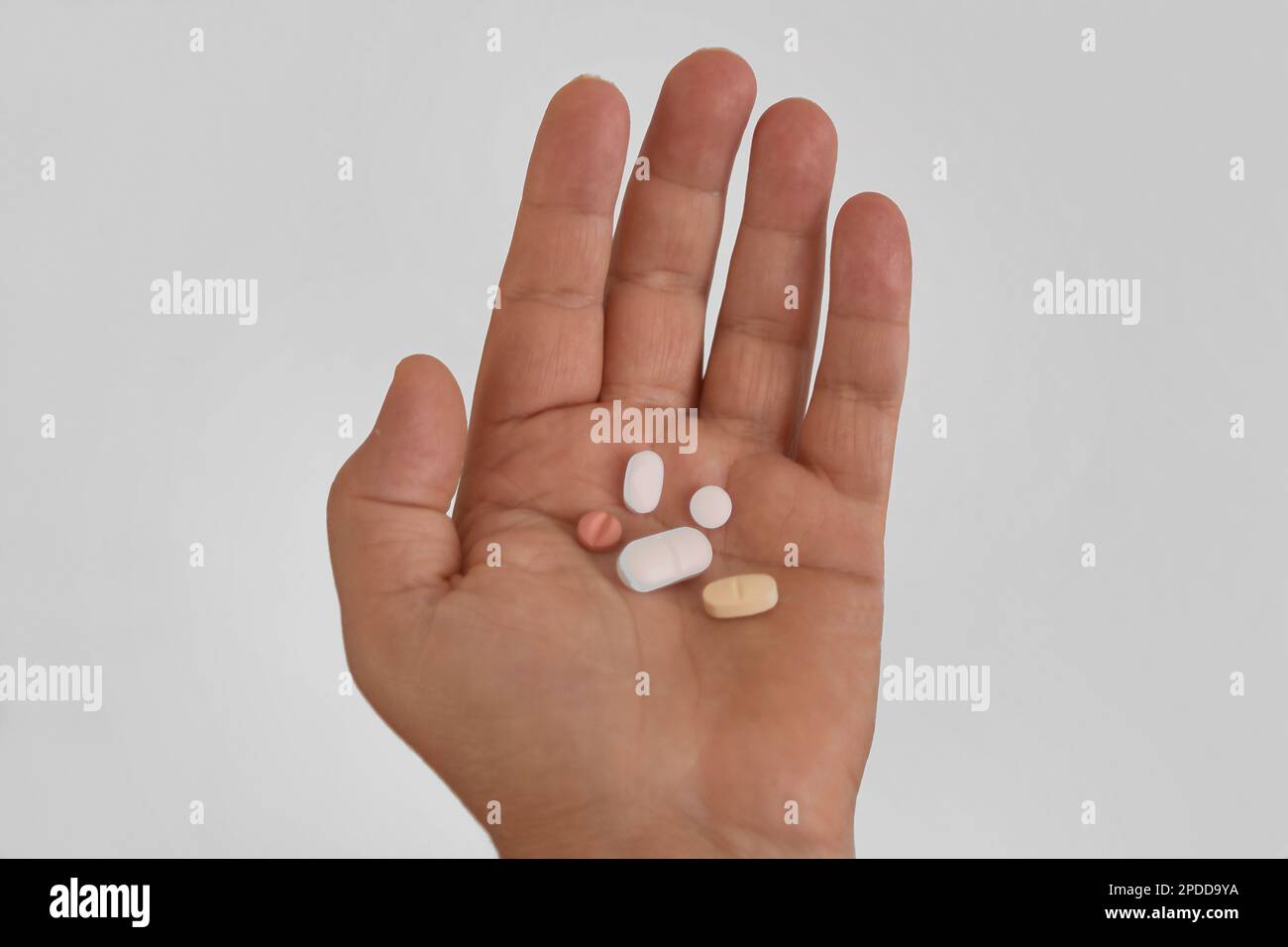 various tablets in hand Stock Photo Alamy