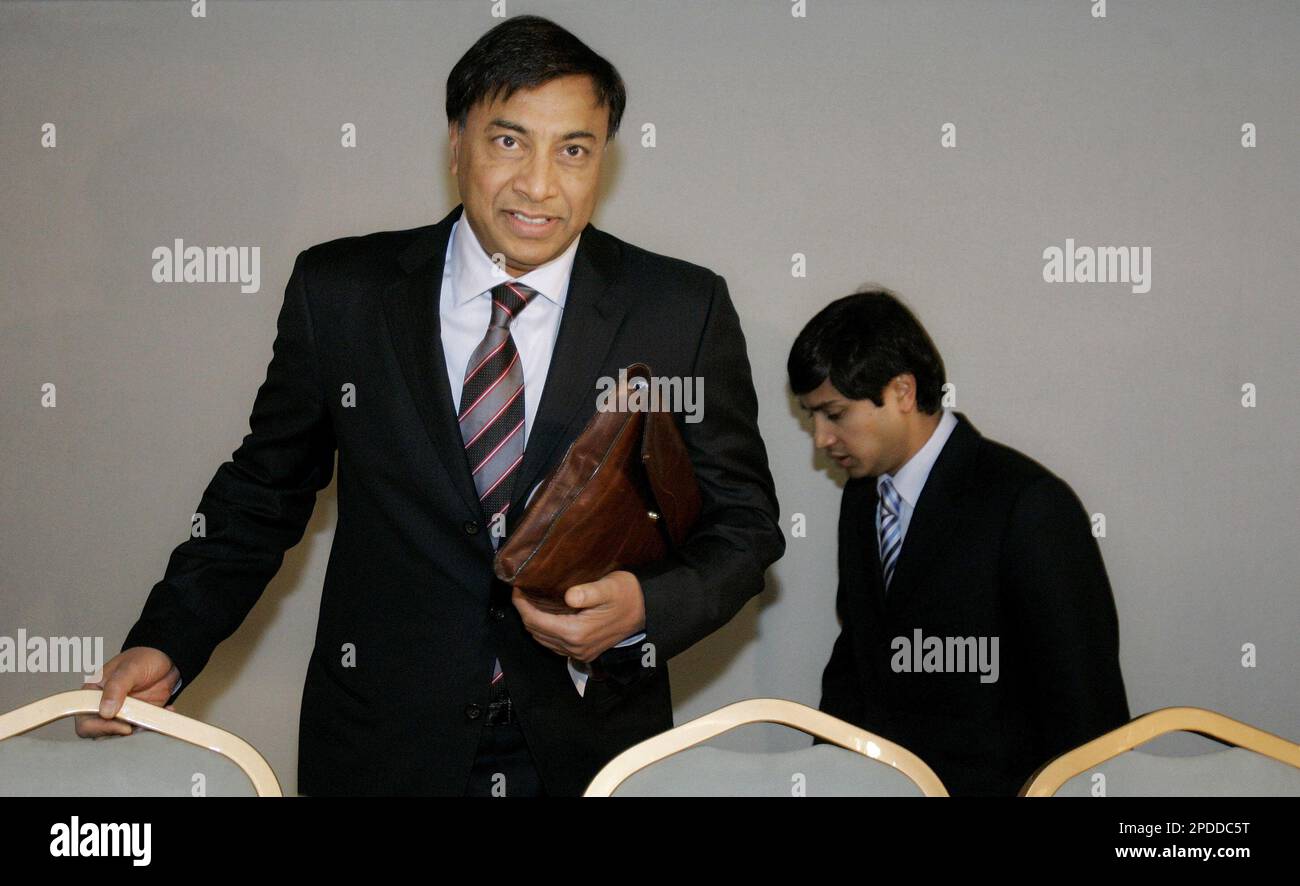 FILE ** Mittal Steel President Aditya Mittal, left, and Chief Executive  Officer Lakshmi Mittal, right, are seen at the start of a media conference  in Rotterdam, the Netherlands, in this Tuesday