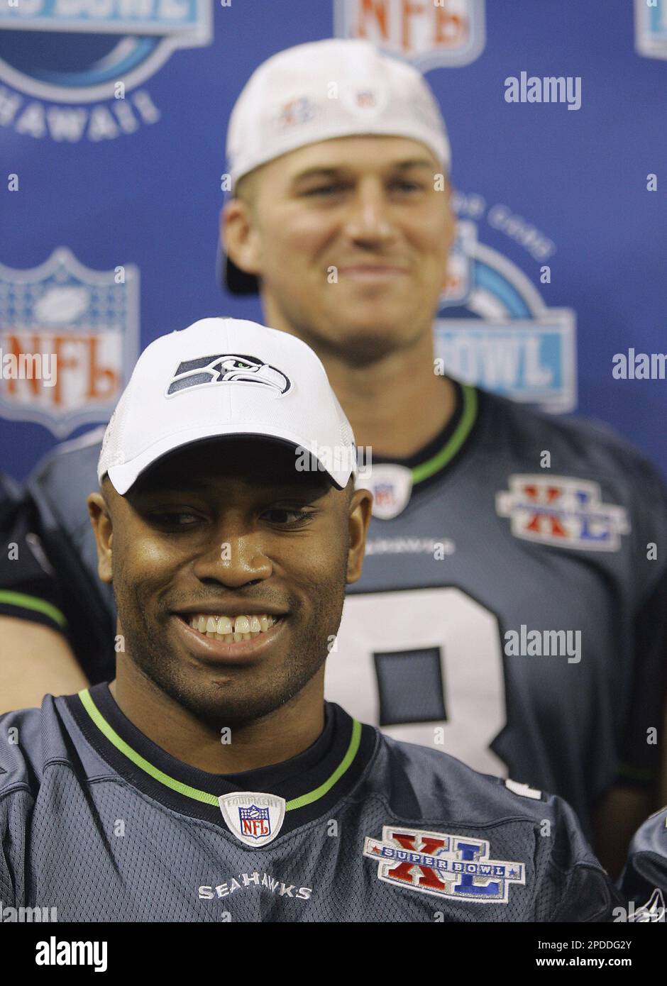 Seattle Seahawks running back Shaun Alexander, front, poses with
