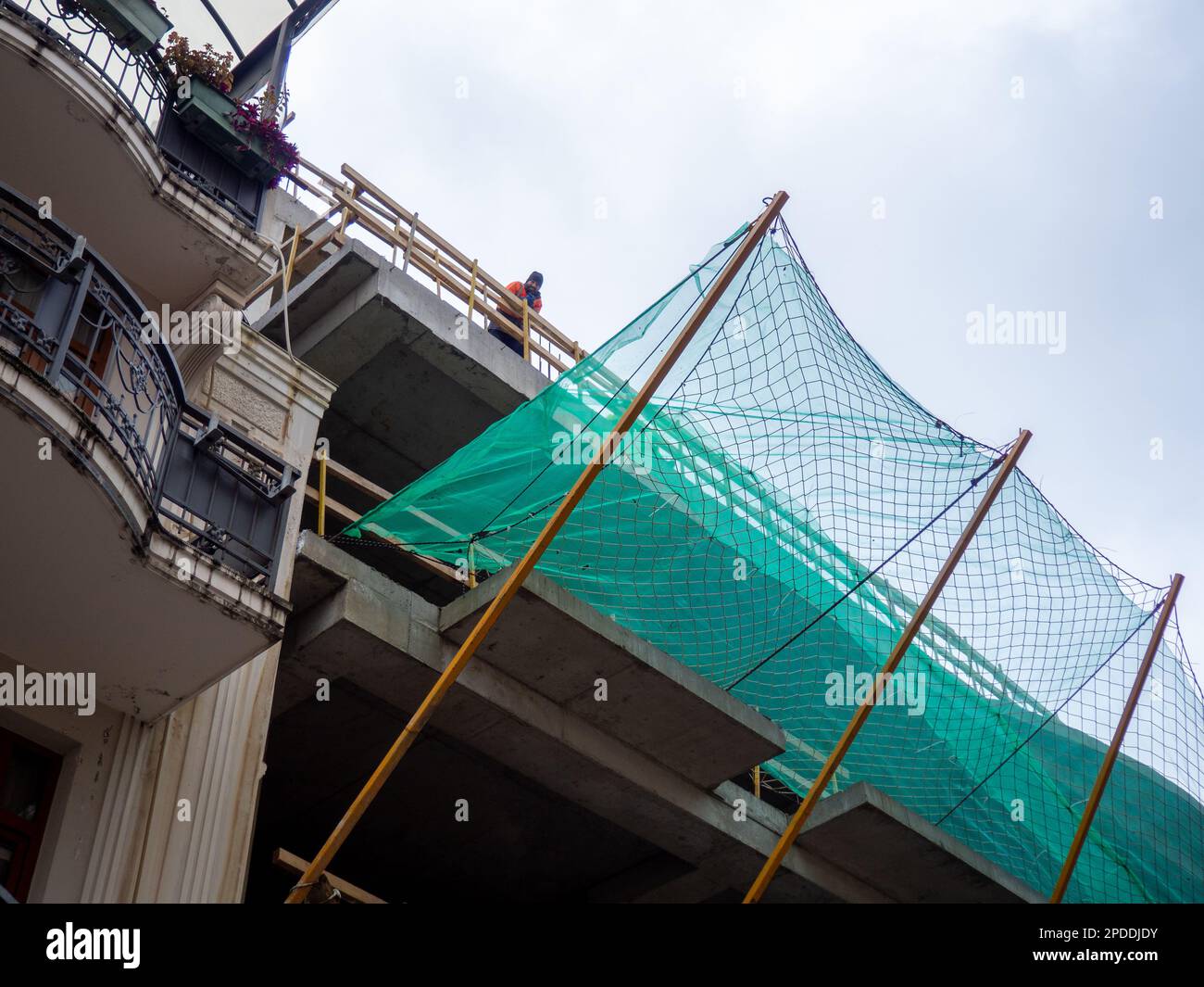Batumi, 02.10.2023 Building construction. Construction site safety net. Construction