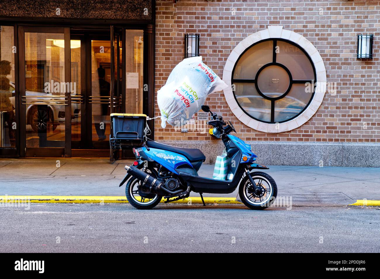 Party City Balloons on Moped Stock Photo Alamy