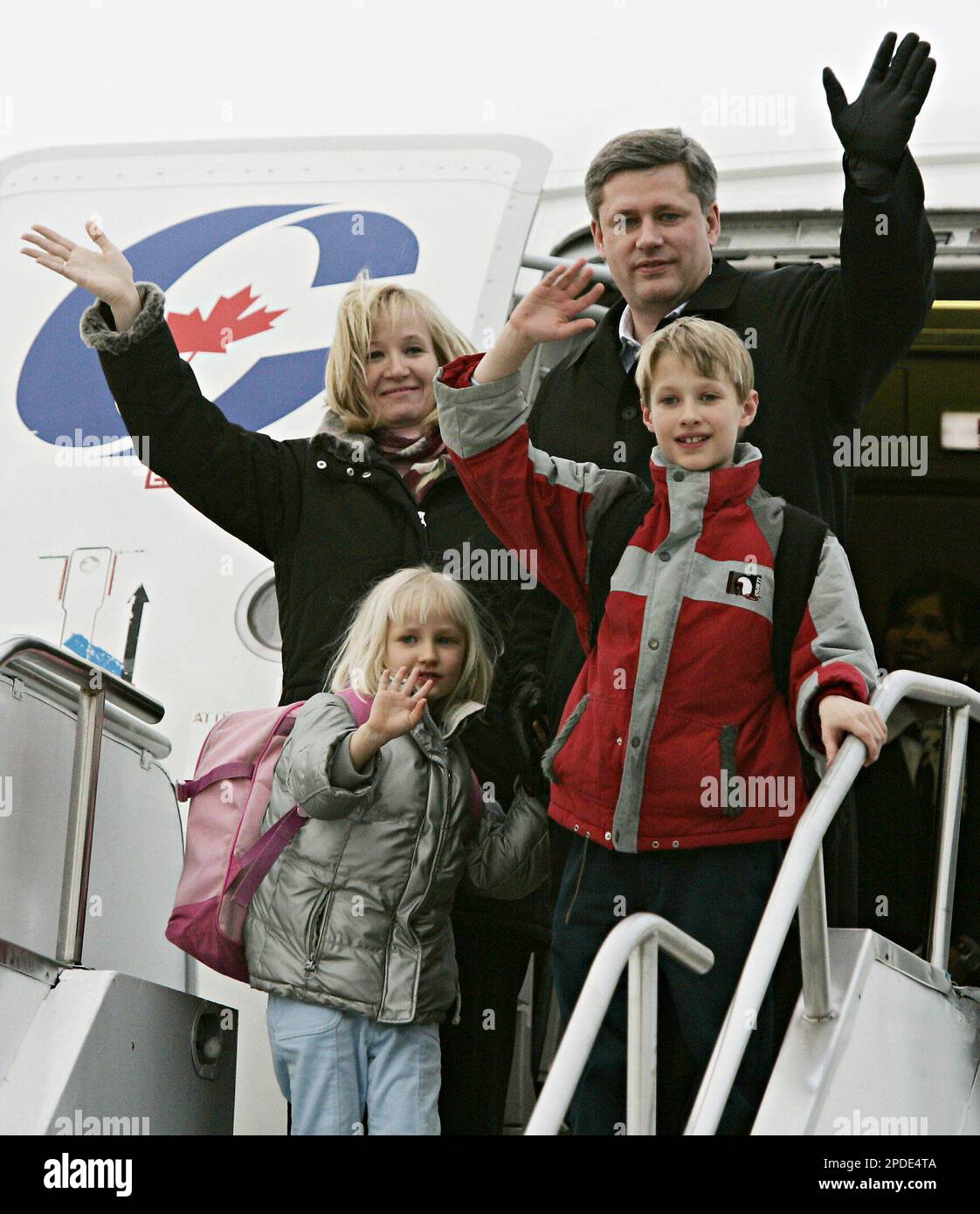 Conservative Leader and Prime Minister-designate Stephen Harper along with  wife Laureen Teskey , left, son Ben, right, and daughter Rachel wave as  they arrive in Ottawa, Tuesday, Jan. 24, 2006. Harper and