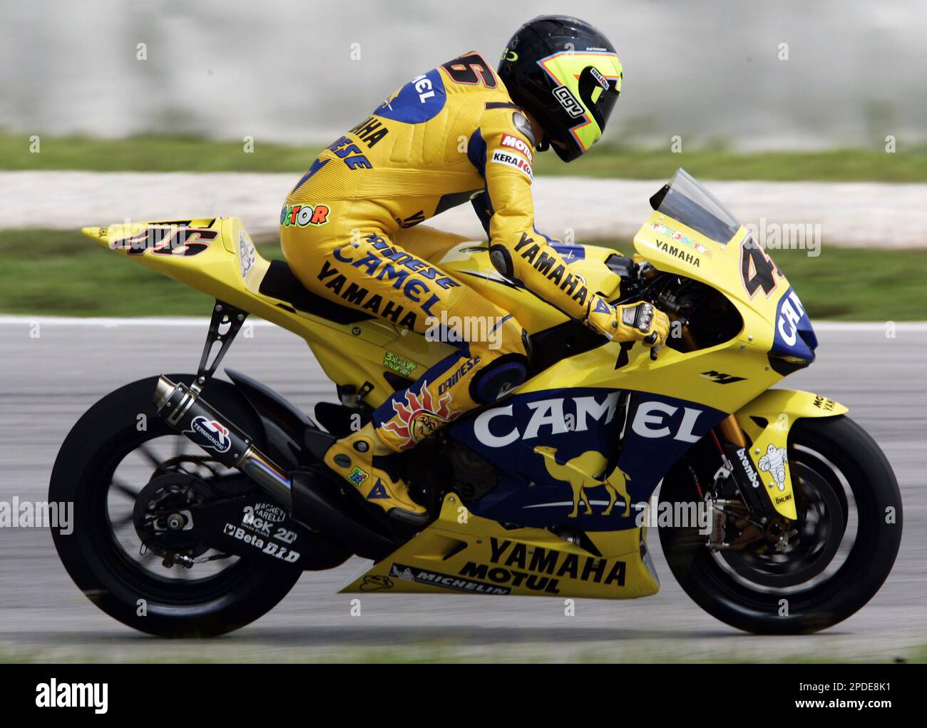 World MotoGP champion, Italian Valentino Rossi steers his new Yamaha during a test ride at the International Circuit of Sepang, Malaysia, Monday, Jan. 23, 2006. (AP Photo/Vincent Thian Stock Photo - Alamy