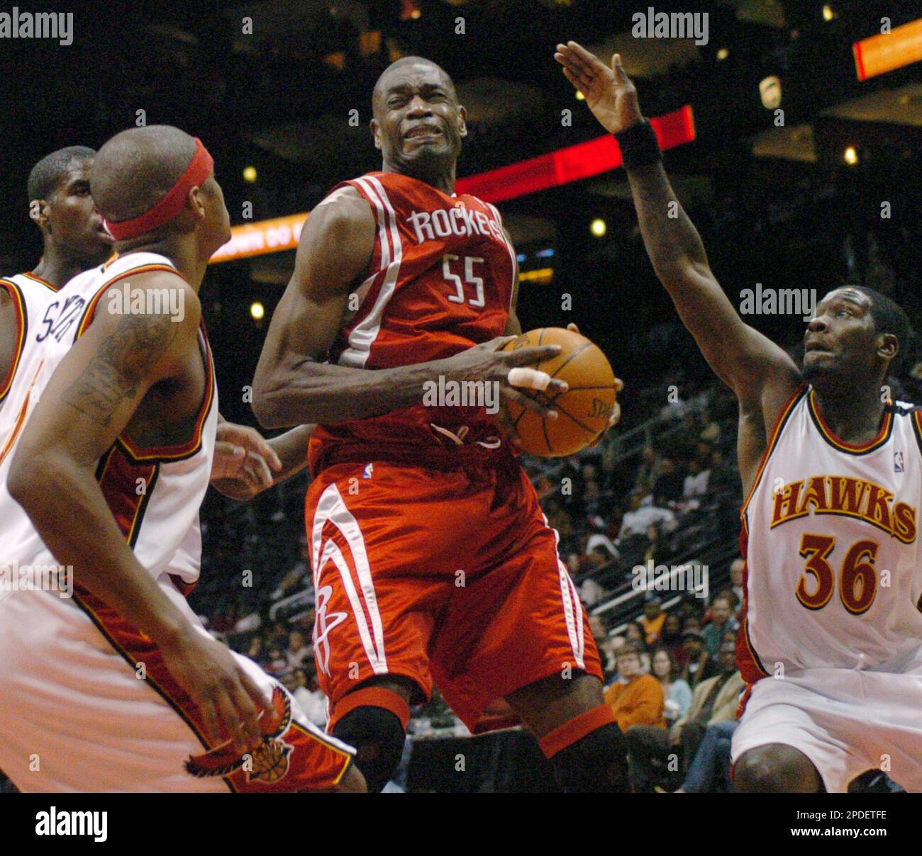 Houston Rockets center Dikembe Mutombo, left, of Congo, and guard