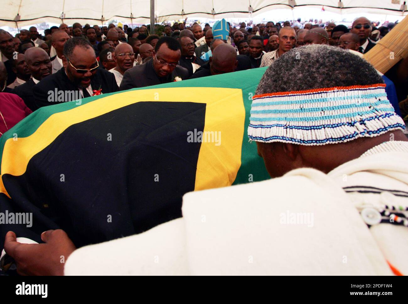 Unidentified Xhosa royal family member pay a tribute to the late Xhosa King Xolilizwe Sigcawu