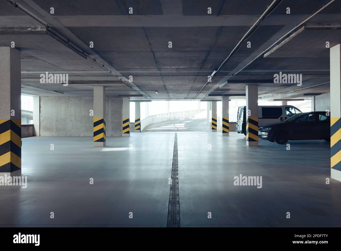 Open car parking garage with ramp on sunny day Stock Photo Alamy