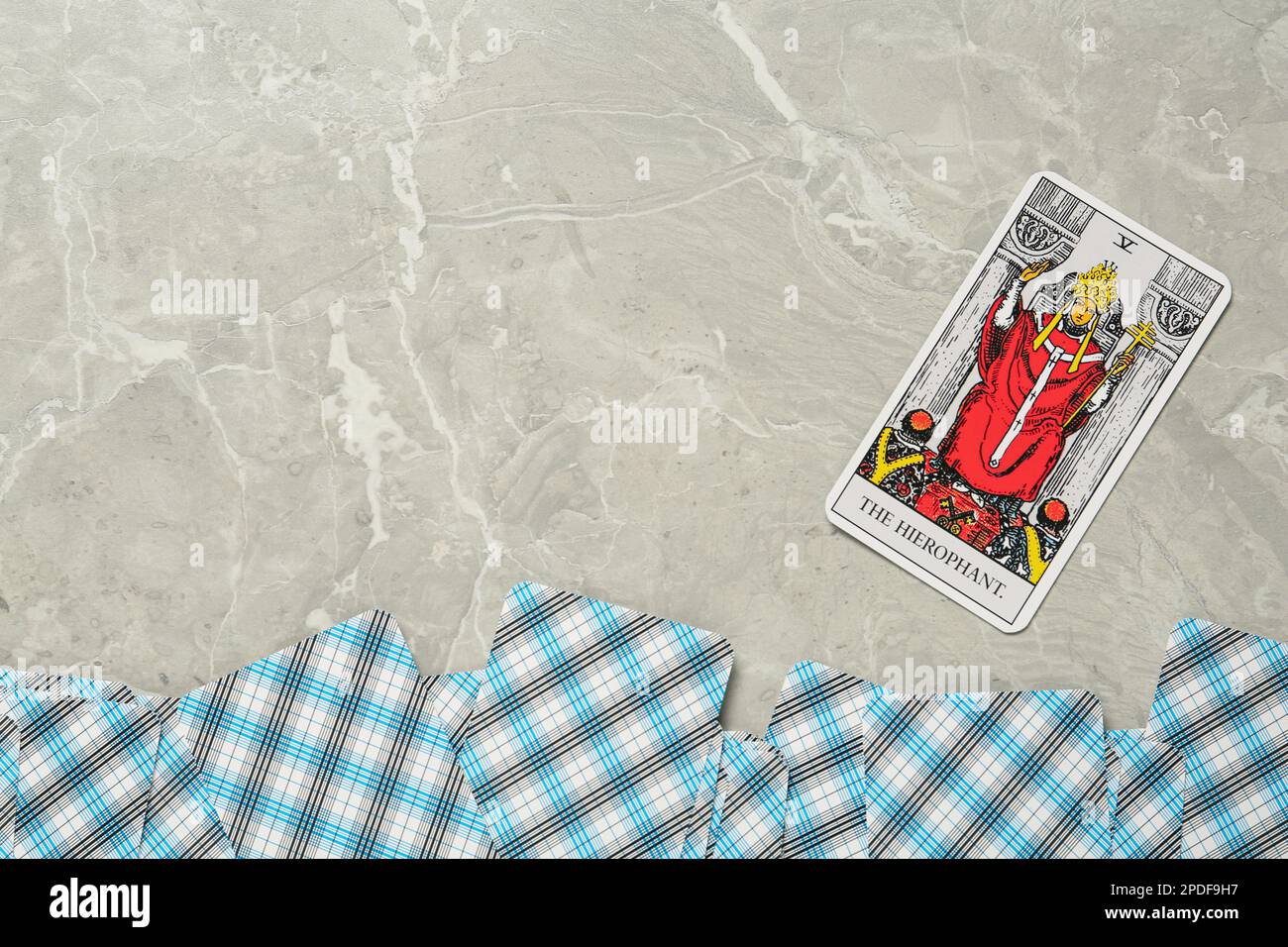 The Hierophant and other tarot cards on light grey marble table, flat lay. Space for text Stock Photo