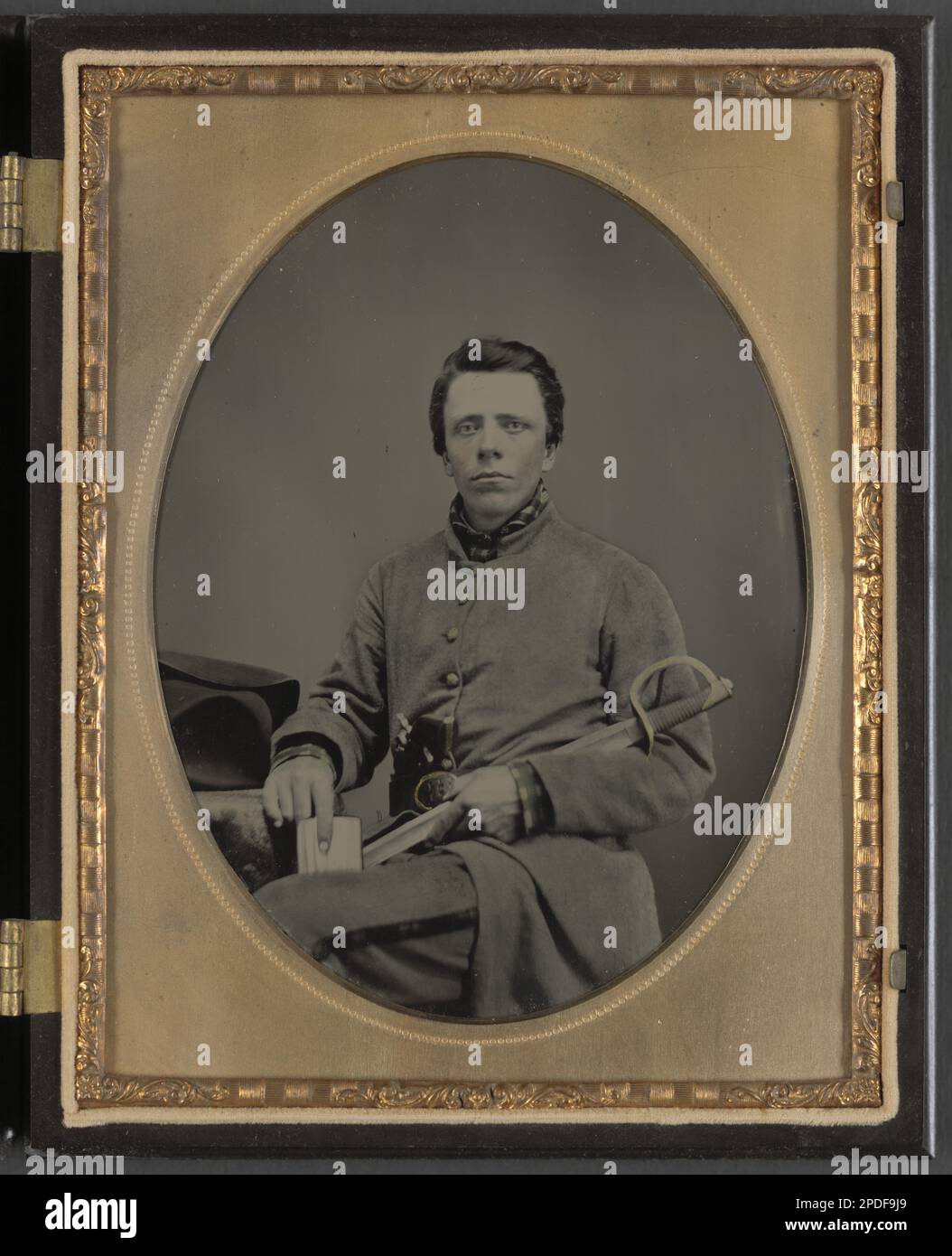 Private W.R. Clack of Co. B, 43rd Tennessee Infantry Regiment, with saber,  pistol, and small book. Liljenquist Family Collection of Civil War  Photographs , FAmbrotype/Tintype photograph filing series , pp/liljconfed.  Clack, W.