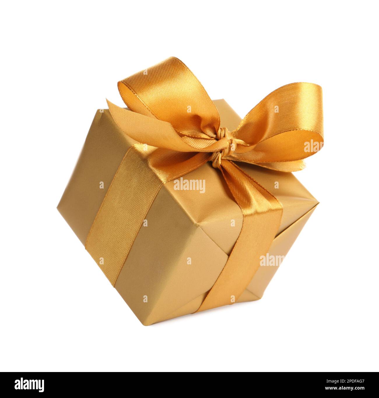 Gift box with golden ribbon and bow on white background Stock Photo - Alamy