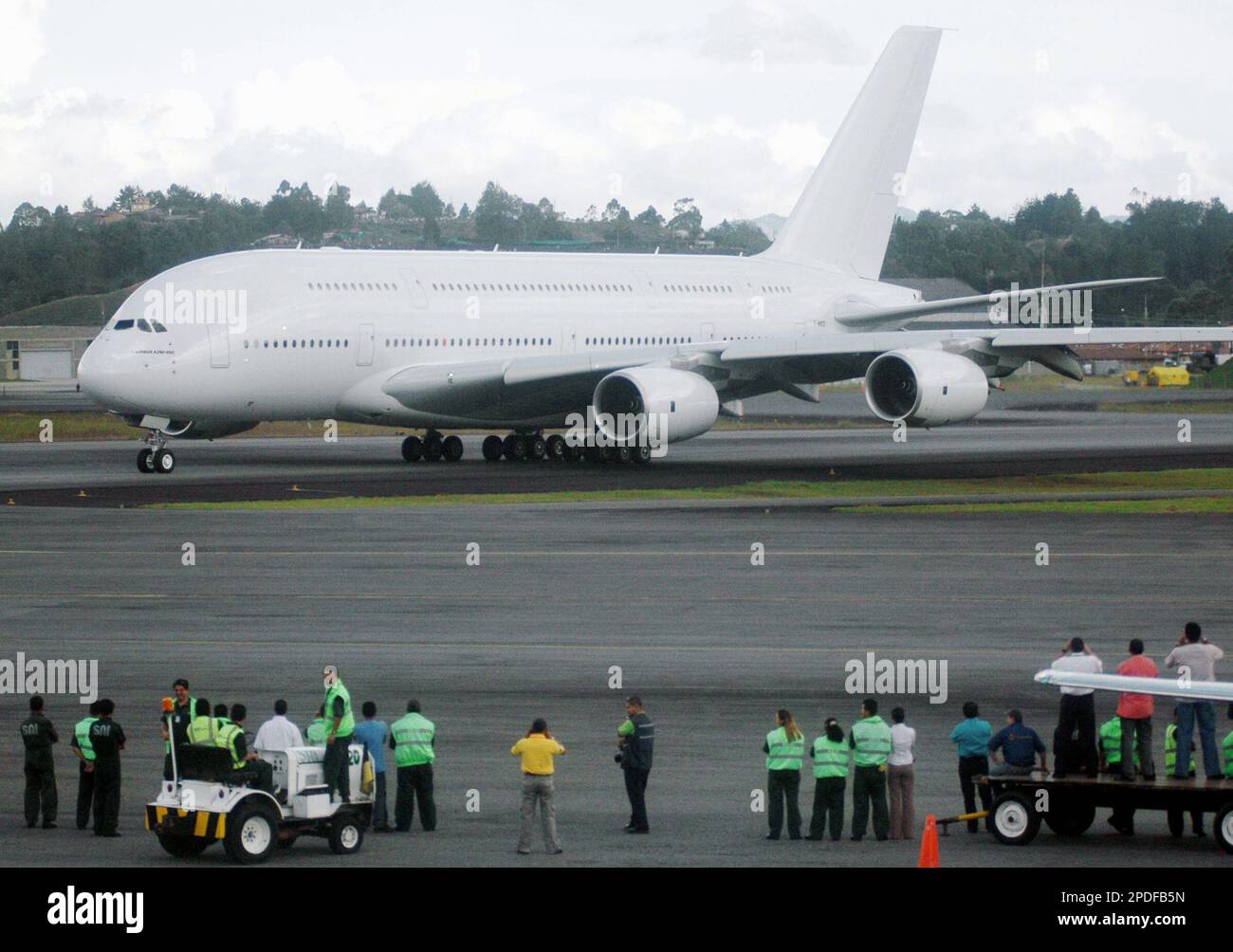 People watch the world's largest passenger jet Airbus A380 at the Jose ...