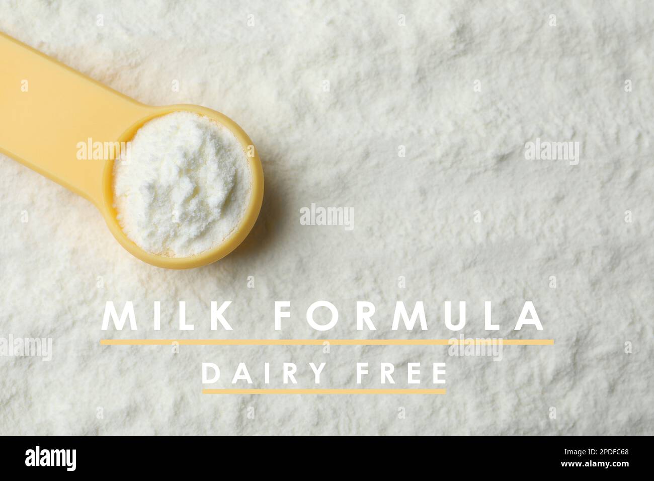Top view of powdered dairy free infant formula and scoop. Baby milk